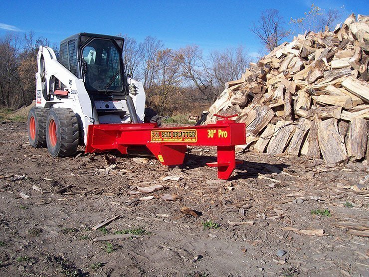 tm_pro-2_splitting_logs.jpg TM Pro 2 Log Splitter Skid Steer Attachment (24”, 30” or 36” Stroke) - Image 1